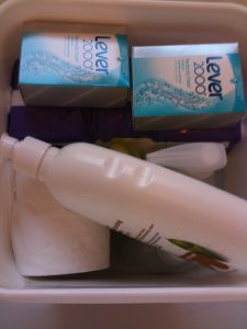personal care items in a bucket